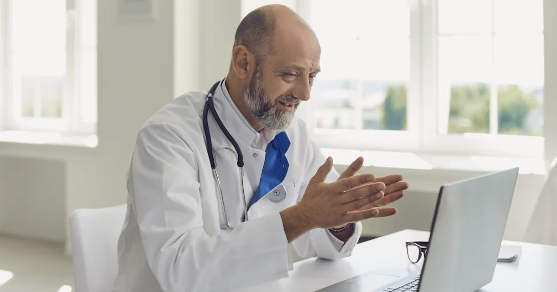 Healthcare provider on a computer Healthcare provider on a computer
