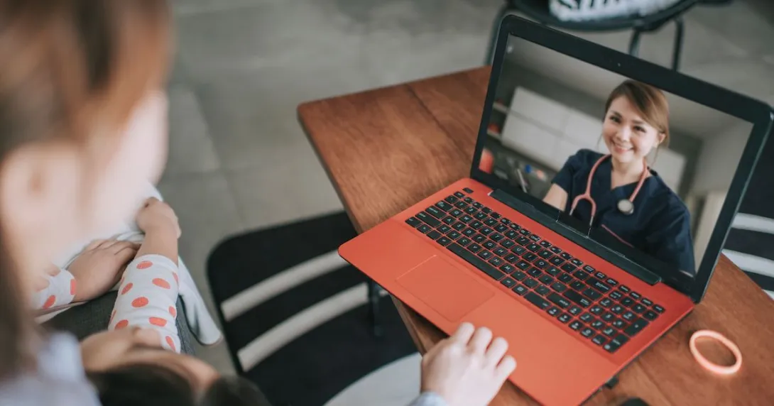 
  A person talking to a provider on a video chat.
